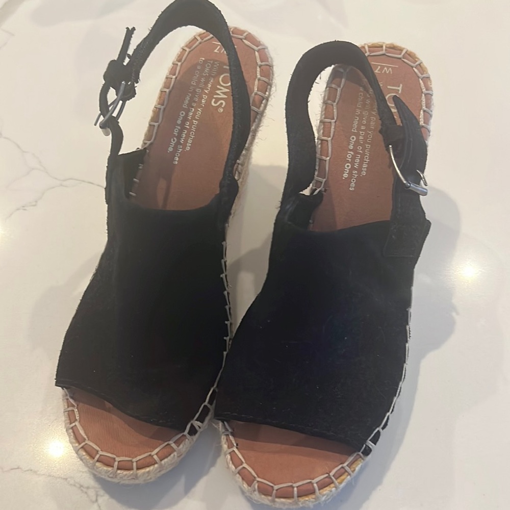 Like new never been worn outside Toms wedge sandals size 7
